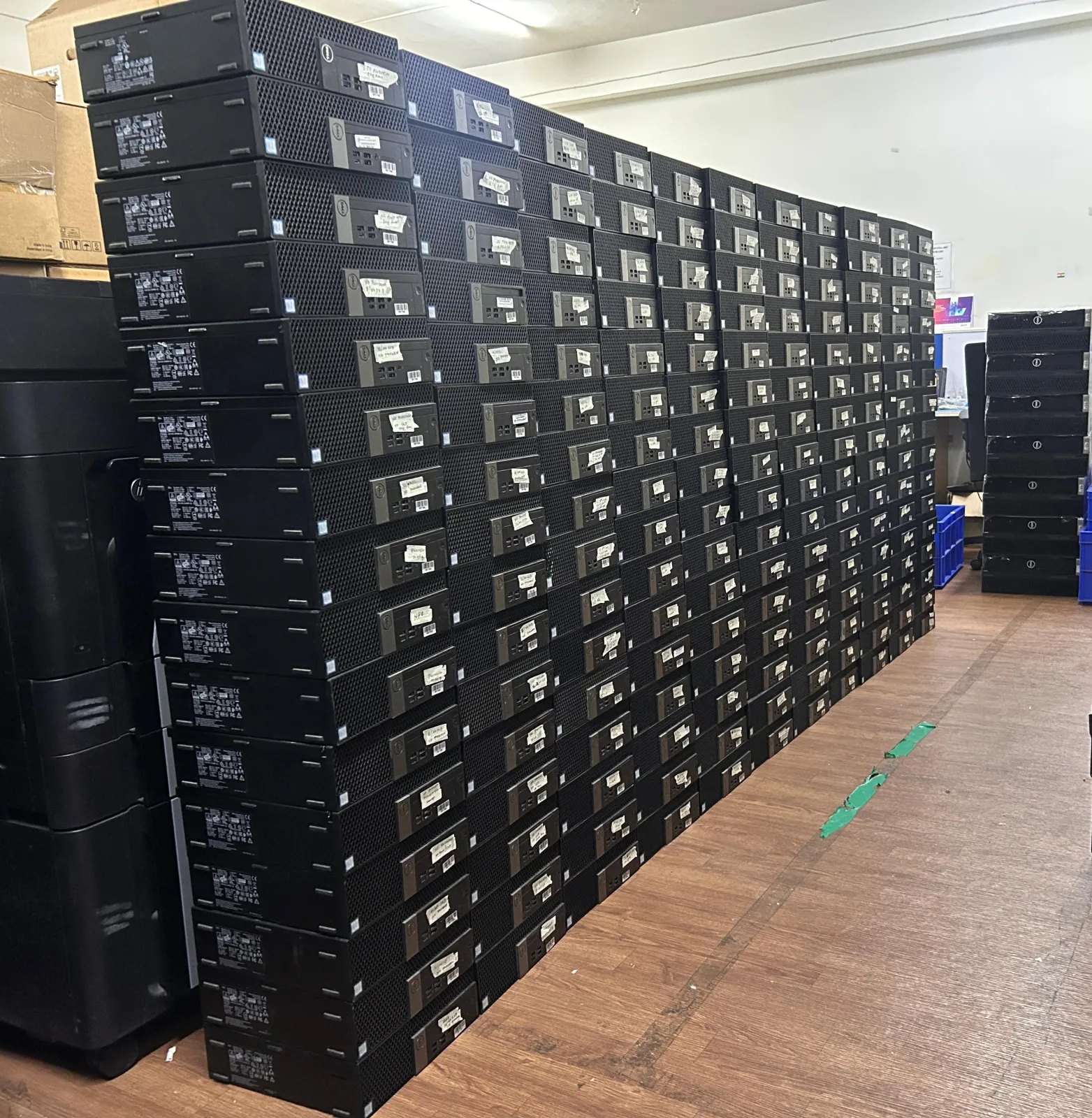 Stacked Dell desktop inventory