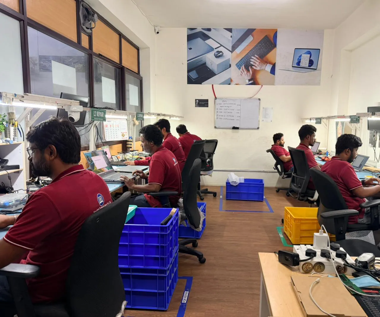 L2 repair room technicians at work
