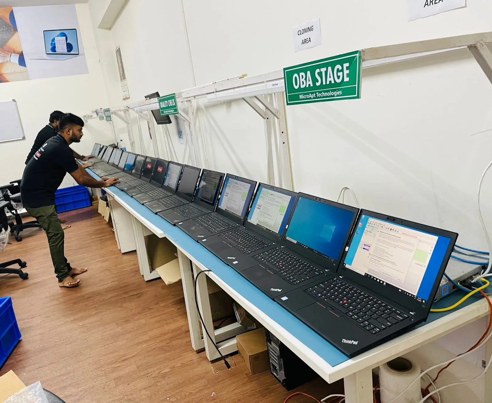 OBA stage — laptop cloning & quality check line
